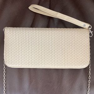 Versatile; clutch, wristlet, shoulder or crossover.